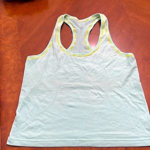 Lululemon Swiftly Tank color mint green with yellow trim size 4